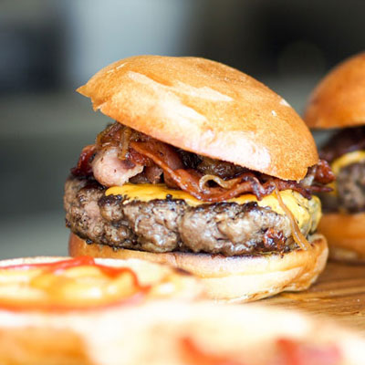 close-up of sliced rustic burgers